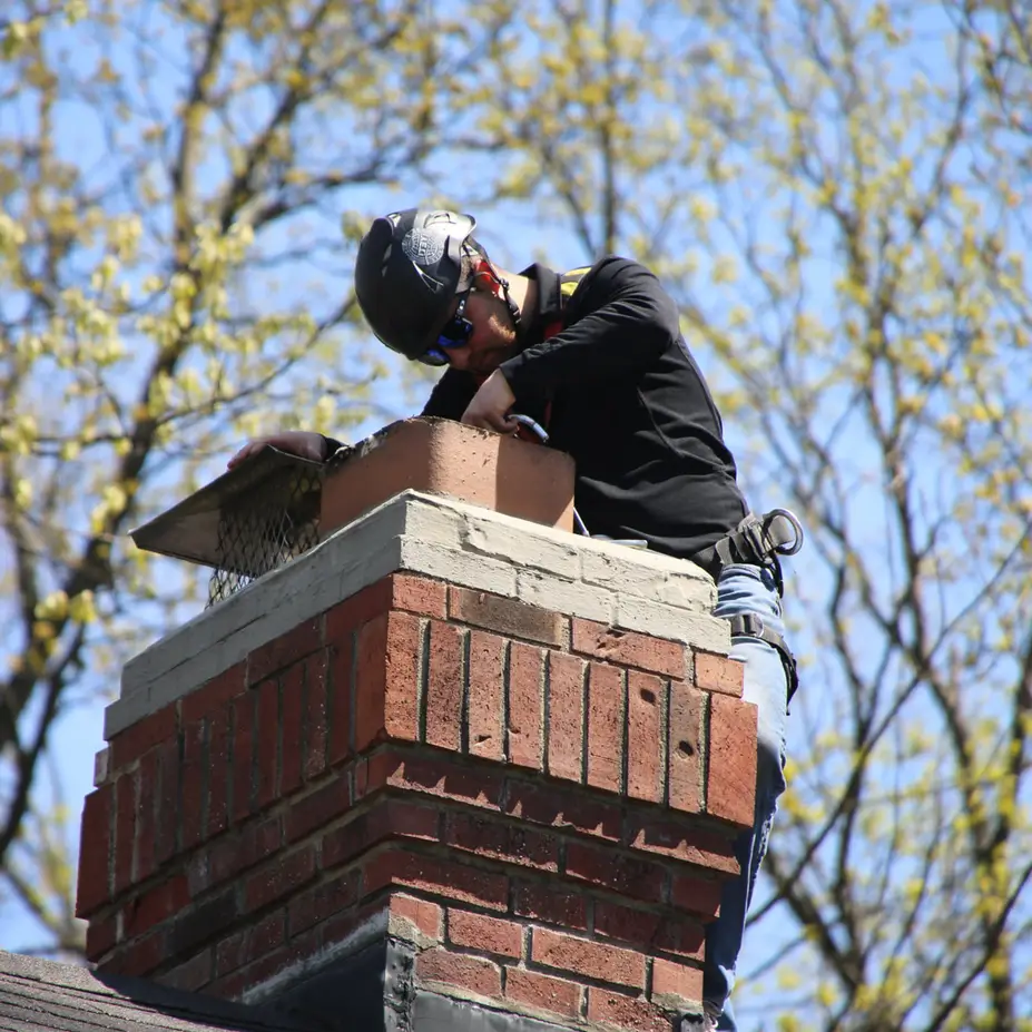 коминочистач почиства комин